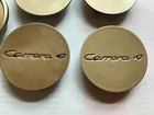 (4) Genuine Porsche 911 996 997 Carrera Wheel Centre Caps, Aurum OP9 Met Matte Used. Price: $76.00.