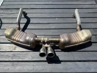 Porsche 981 Cayman Sports Exhaust System (oem) - Silver Stanless Steel Used. Price: $810.00.